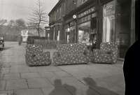 Three piece suite outside Louis Upholsterers