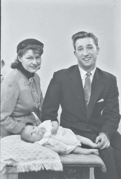 Portrait of a couple with baby