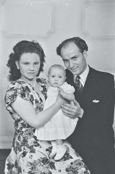 Portrait of a couple with baby