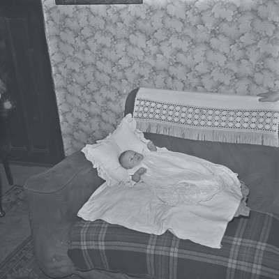 Portrait of a baby in Christening Gown