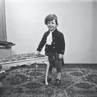 Portrait of a child wearing a kilt
