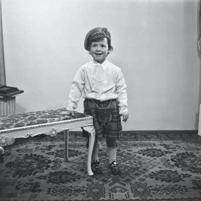 Portrait of a child wearing a kilt