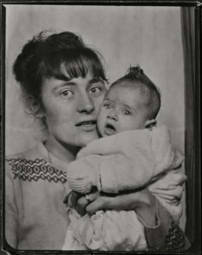 Portrait of a woman with baby