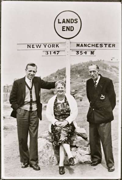 Portrait of three people at Lands End marker