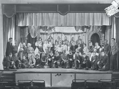 Theatrical cast on stage