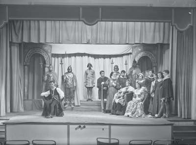 Theatrical cast on stage
