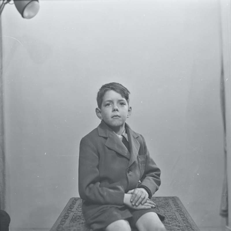 Portrait of a boy in a coat