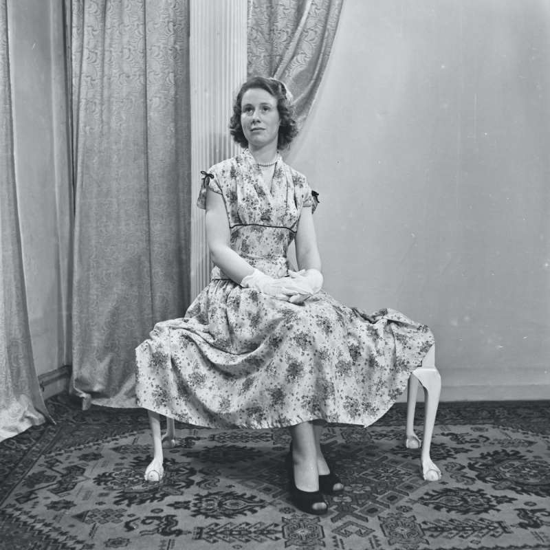 Portrait of a woman in a patterned dress
