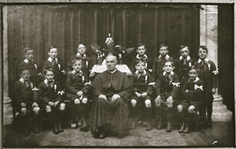 Group portrait with Priest