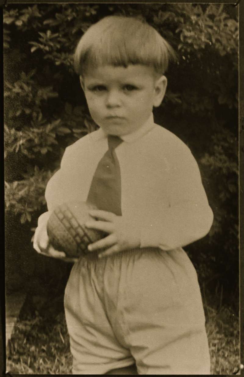Portrait of a young boy with a ball