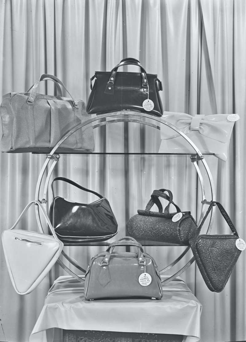 Series of handbags on  a display stand