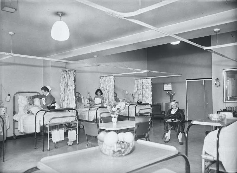 Hospital ward interior with nurses