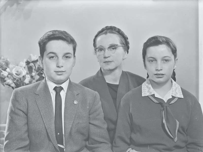Portrait of a woman, a boy and a girl
